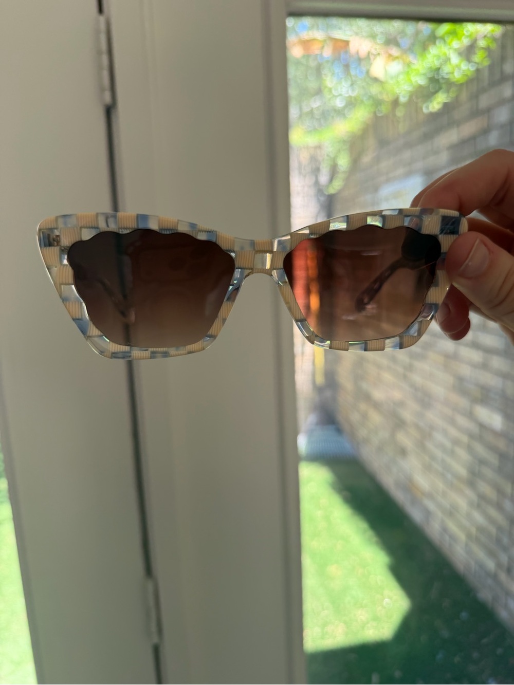 Krewe Brigitte Sunglasses in white and clear checker